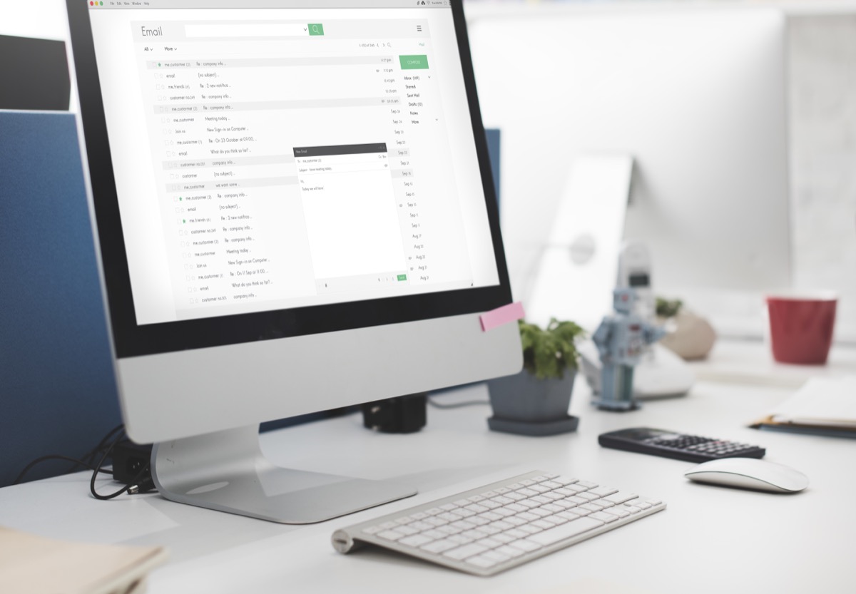 Desktop computer showing email inbox — setting up team email signatures in Microsoft 365